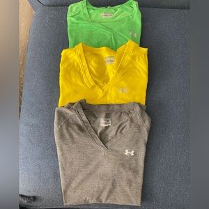 Lot of 3 Under Armour Loose Fit/Short sleeve/v-neck t-shirts. Used. Size XS.